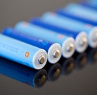 11526690 - aa size nimh batteries in a row with focus on the first one